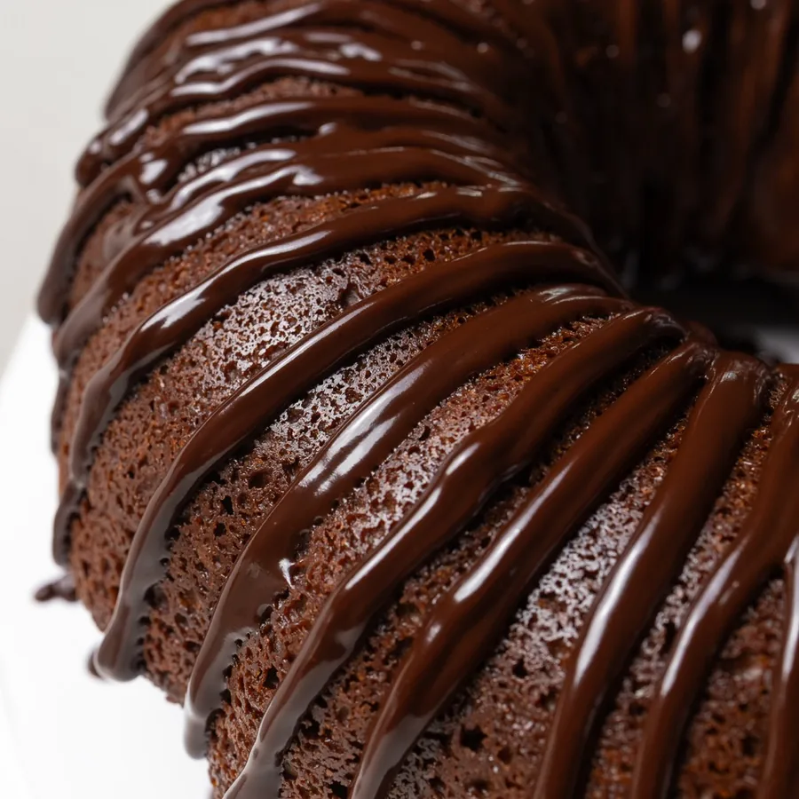 A full size chocolate bundt cake with chocolate glaze.